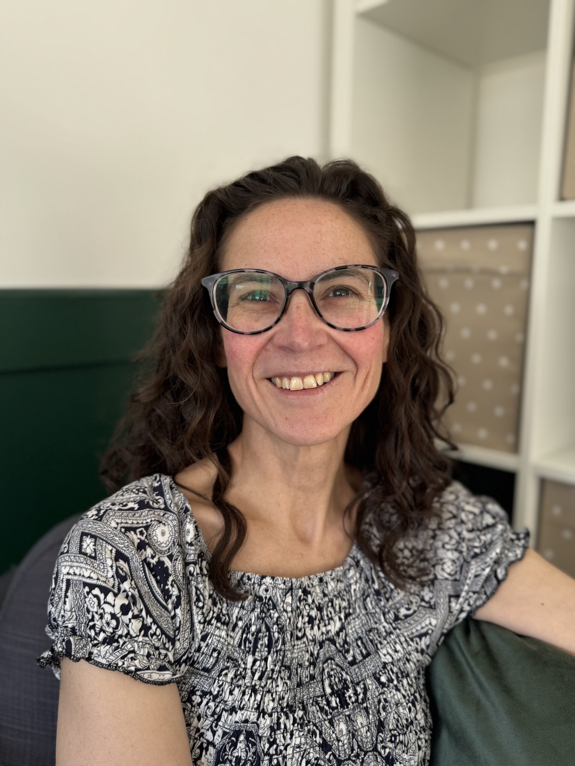 A warm, friendly portrait of Rebecca Wilkinson, a counsellor in Plymouth offering relational, person‑centred therapy.